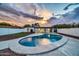 Inviting kidney-shaped pool with artificial turf and a modern design at 4307 N 15Th Dr, Phoenix, AZ 85015