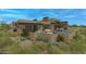 Modern desert home with a private pool and landscaped backyard at 10308 E Filaree Ln, Scottsdale, AZ 85262