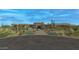 Luxury home with desert landscaping and a large driveway at 10308 E Filaree Ln, Scottsdale, AZ 85262