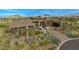 Modern home nestled in the desert landscape with mountain views at 10308 E Filaree Ln, Scottsdale, AZ 85262
