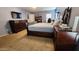 Main bedroom with carpeted floor and ample closet space at 6349 W Valencia Dr, Laveen, AZ 85339