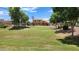 Community park with playground and grassy areas at 6349 W Valencia Dr, Laveen, AZ 85339