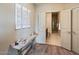 Bright entryway with contemporary console table and view of bathroom at 945 E Playa Del Norte Dr # 2008, Tempe, AZ 85288