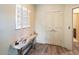 Light and airy entryway, featuring a console table and access to other rooms at 945 E Playa Del Norte Dr # 2008, Tempe, AZ 85288