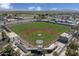 Aerial view of baseball field with bleachers and surrounding area at 5688 S 243Rd Dr, Buckeye, AZ 85326