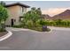 Gated community entrance with modern design and landscaping at 18720 N 101St St # 3019, Scottsdale, AZ 85255