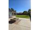 Large backyard with fire pit and expansive grassy area at 35066 N Happy Jack Dr, San Tan Valley, AZ 85144