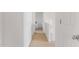 Simple hallway with carpeted floors at 35066 N Happy Jack Dr, San Tan Valley, AZ 85144
