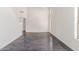 Bright living room with polished concrete floors and large windows at 35066 N Happy Jack Dr, San Tan Valley, AZ 85144