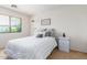 Serene bedroom with a double bed and stylish decor at 35066 N Happy Jack Dr, San Tan Valley, AZ 85144