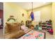 Fun playroom with colorful decor, beanbag chair and toy storage at 4455 W Suncup Dr, San Tan Valley, AZ 85144