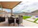 Inviting backyard with patio, pool, and artificial turf at 4455 W Suncup Dr, San Tan Valley, AZ 85144