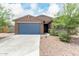 Modern house exterior with gray garage door at 4455 W Suncup Dr, San Tan Valley, AZ 85144