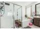 Clean bathroom with walk-in shower and soaking tub at 4455 W Suncup Dr, San Tan Valley, AZ 85144