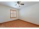 Spacious bedroom with wood flooring and window shutters at 14602 N Olympic Way, Fountain Hills, AZ 85268