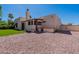 Rear exterior view, showcasing stucco and gravel landscaping at 14602 N Olympic Way, Fountain Hills, AZ 85268