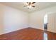 Bright bedroom with wood flooring and ceiling fan at 14602 N Olympic Way, Fountain Hills, AZ 85268