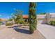 Single story home with two-car garage and desert landscaping at 14602 N Olympic Way, Fountain Hills, AZ 85268