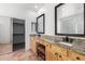 Elegant bathroom with double vanity and granite countertops at 3386 W Hemingway Ln, Anthem, AZ 85086