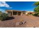 Home with a large backyard and gravel landscaping at 42425 W North Star Dr, Maricopa, AZ 85138