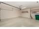 Garage with overhead storage and shelving at 42425 W North Star Dr, Maricopa, AZ 85138