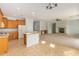 Kitchen with island and wood cabinets at 42425 W North Star Dr, Maricopa, AZ 85138