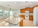 Open kitchen island with double sink and dishwasher at 42425 W North Star Dr, Maricopa, AZ 85138