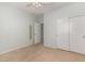 Bright bedroom with mirrored closet and neutral carpeting at 42425 W North Star Dr, Maricopa, AZ 85138