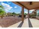 Covered patio overlooking the backyard at 42425 W North Star Dr, Maricopa, AZ 85138