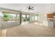 Open living space with sliding doors to backyard at 42425 W North Star Dr, Maricopa, AZ 85138