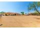 House exterior with a large gravel driveway and landscaping at 2224 W Speer Trl, Phoenix, AZ 85086