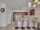 Island kitchen with granite countertops and stainless steel appliances at 40261 N La Cantera Dr, Anthem, AZ 85086