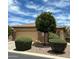 Single-story home with stone accents and landscaped front yard at 40261 N La Cantera Dr, Anthem, AZ 85086