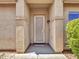 Front door with decorative screen and welcome mat at 40261 N La Cantera Dr, Anthem, AZ 85086