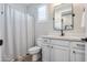 Clean bathroom with a shower/tub combo and modern vanity at 15820 S 177Th Dr, Goodyear, AZ 85338