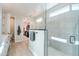 Spa-like bathroom with walk-in shower, large closet, and modern vanity at 15820 S 177Th Dr, Goodyear, AZ 85338