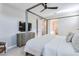 Spacious bedroom with a four-poster bed, dresser, and ensuite bathroom at 15820 S 177Th Dr, Goodyear, AZ 85338