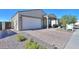 A charming one-story home with a two-car garage and landscaped yard at 15820 S 177Th Dr, Goodyear, AZ 85338