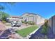 Private backyard with patio, artificial turf, and lush landscaping at 15820 S 177Th Dr, Goodyear, AZ 85338