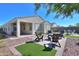 Spacious backyard patio with fire pit and seating area at 15820 S 177Th Dr, Goodyear, AZ 85338