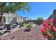 Relaxing backyard with fire pit, seating, and artificial turf at 15820 S 177Th Dr, Goodyear, AZ 85338