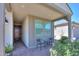 Covered entry with two chairs and a small table at 15820 S 177Th Dr, Goodyear, AZ 85338
