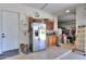 Garage with refrigerator, cabinets, and ample storage at 7009 W Palomino Way, Coolidge, AZ 85128