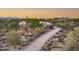 Desert house with long driveway, aerial view at 8300 E Dixileta Dr # 253, Scottsdale, AZ 85266
