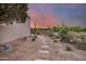 Landscaped yard with stone pathway and desert plants at 8300 E Dixileta Dr # 253, Scottsdale, AZ 85266