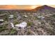 Aerial view of house with backyard and desert landscape at 8300 E Dixileta Dr # 253, Scottsdale, AZ 85266