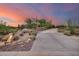 Front yard with long driveway and desert landscaping at 8300 E Dixileta Dr # 253, Scottsdale, AZ 85266