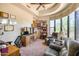Bright home office with large window, built-in shelving and comfortable seating at 8300 E Dixileta Dr # 253, Scottsdale, AZ 85266