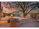 Peaceful backyard patio with fountain, fire pit, and mountain views at 8300 E Dixileta Dr # 253, Scottsdale, AZ 85266
