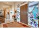 Elegant entryway with a statement stained-glass door and tile flooring at 8300 E Dixileta Dr # 253, Scottsdale, AZ 85266